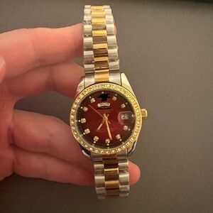 Red and Gold Watch with Moissanite Diamonds around the face
